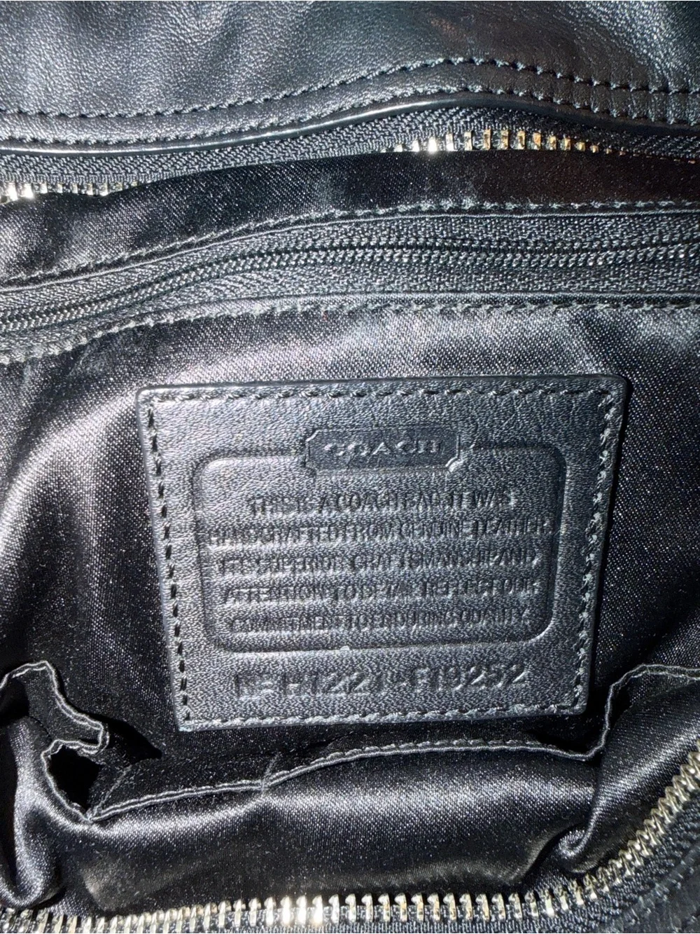 Coach sleek black